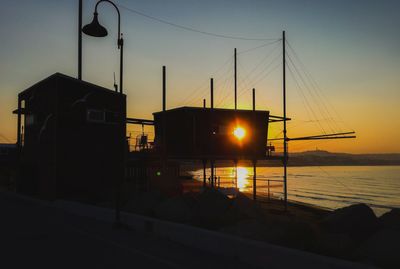 Silhouette of buildings at sunset