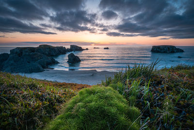 Scenic view of sea against sky during sunset