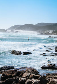 Scenic view of sea against clear sky