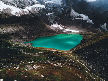 High angle view of lake by mountain