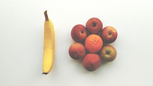 High angle view of apples against white background