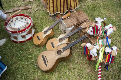 High angle view of guitar on field