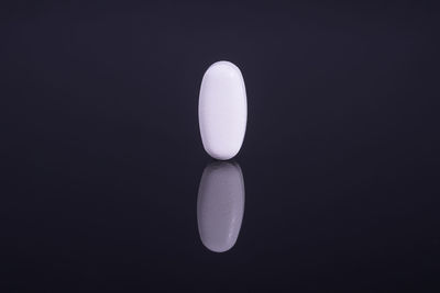 Close-up of moon over black background