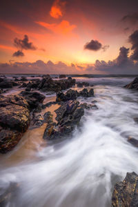 Scenic view of sea against sky during sunset