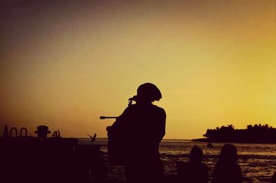 Scenic view of sea at sunset