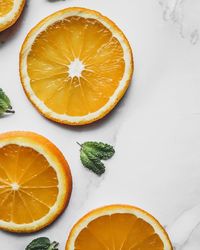 High angle view of orange slices on table