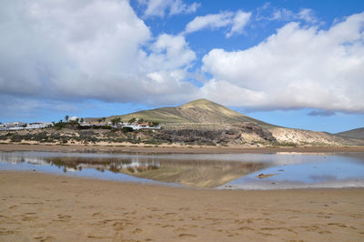 Scenic view of beach against sky