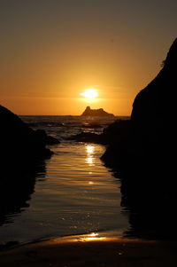 Scenic view of sea at sunset