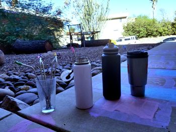 Close-up of wine bottles on table