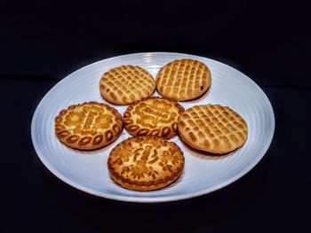 High angle view of cookies in plate