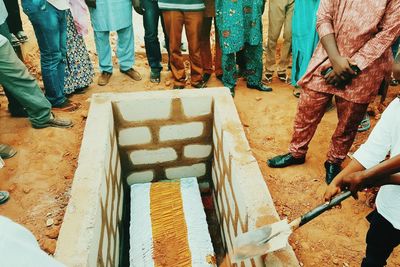 Low section of people at the burial ground