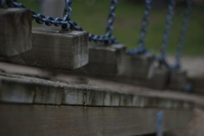 Close-up of chain on bridge, playground