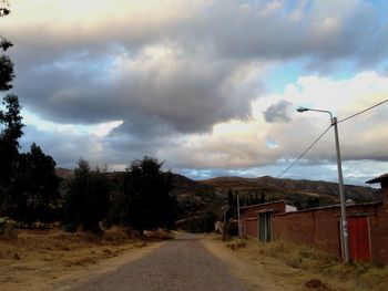 View of road against cloudy sky