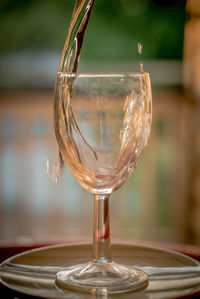 Close-up of wine glass on table