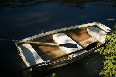 High angle view of boat moored in lake