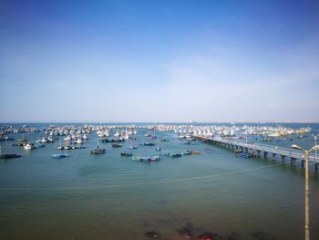 High angle view of sea against blue sky