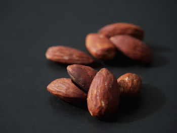 Close-up of peanuts on black background