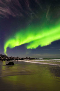 Scenic view of sea against sky at night