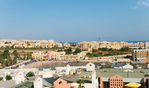 High angle shot of townscape against clear sky