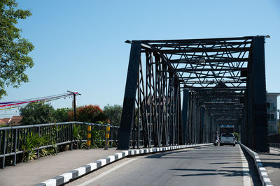 Bridge against sky in city