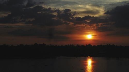 Scenic view of sunset over river