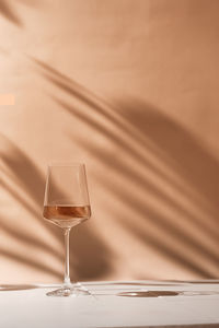Close-up of wineglass on table