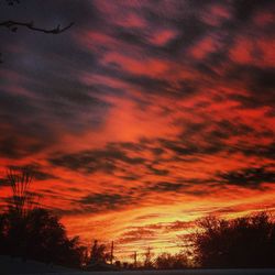 Low angle view of dramatic sky during sunset