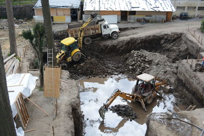 High angle view of bulldozers at construction site