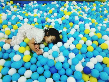 High angle view of woman lying in toy