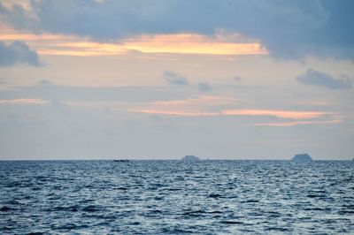 Scenic view of sea at sunset