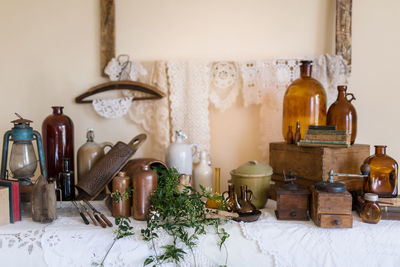 Close-up of old bottles on table