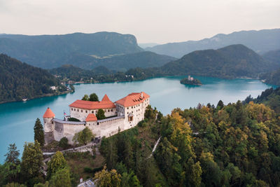 High angle view of bay against mountain range