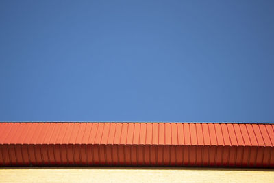 View of sea against clear blue sky