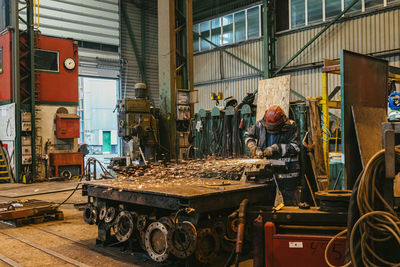 People working in glass building