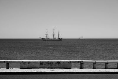 Distance shot of boat in calm sea