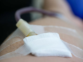 Close-up of person with medical test on hand