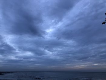 Scenic view of sea against dramatic sky