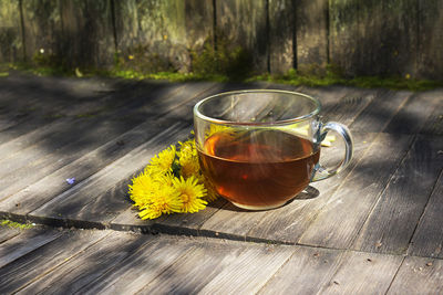 Glass of tea on table
