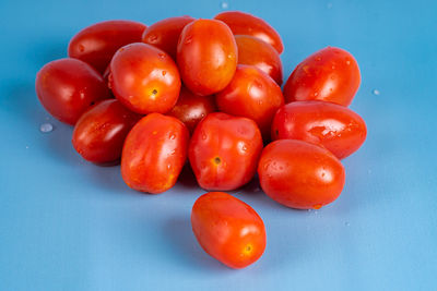 High angle view of cherry tomatoes on table