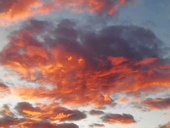 Low angle view of dramatic sky during sunset