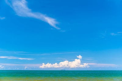 Scenic view of sea against blue sky