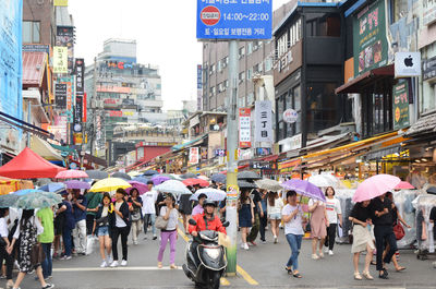 People on street in city