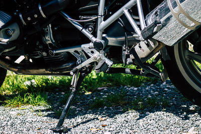 Close-up of machinery on field