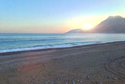 Scenic view of sea at sunset