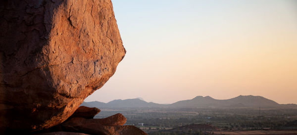 Scenic view of rock formation against sky