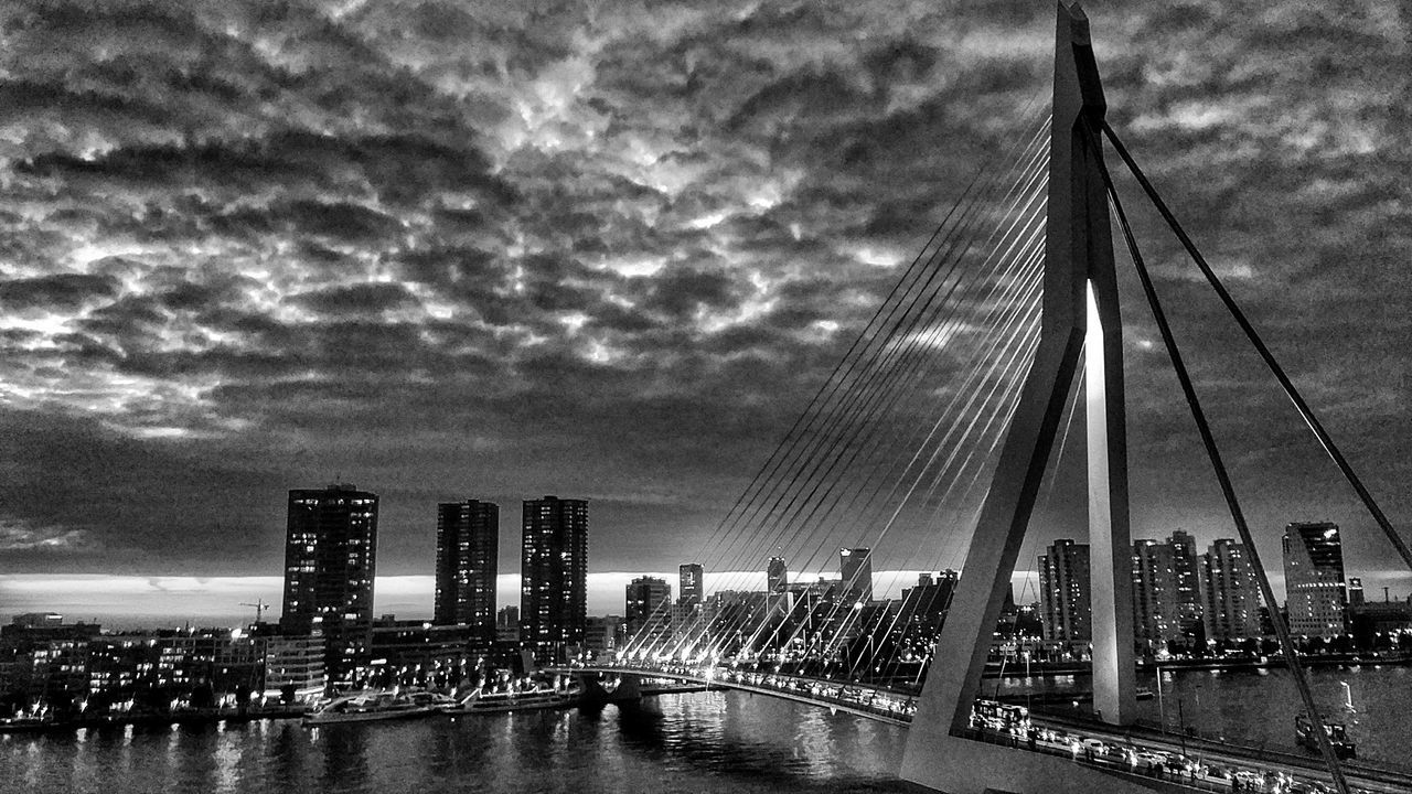 VIEW OF SUSPENSION BRIDGE IN CITY