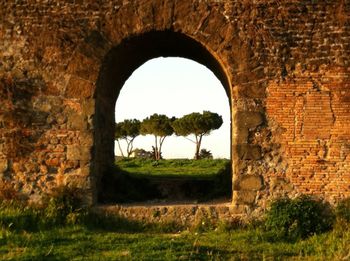 Archway leading to stone wall