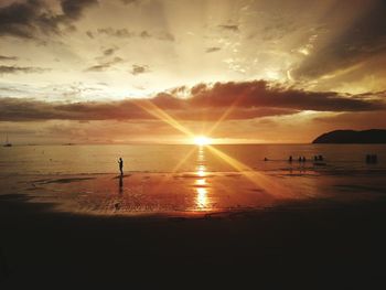 Scenic view of sea at sunset