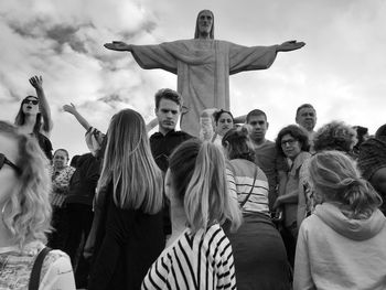 Group of people against the sky