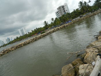 River by city against sky